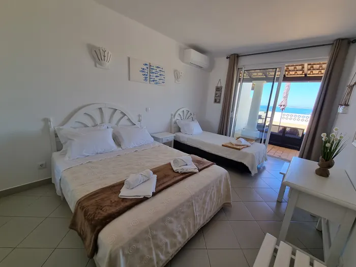 Gaivota Nest | Blue Ocean View — quarto