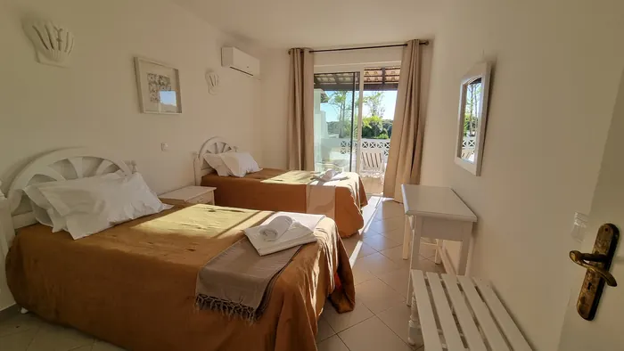 Gaivota Nest | Garden View — quarto